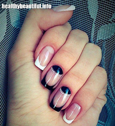 Half-moon nails with a thin line outlining the crescent shape