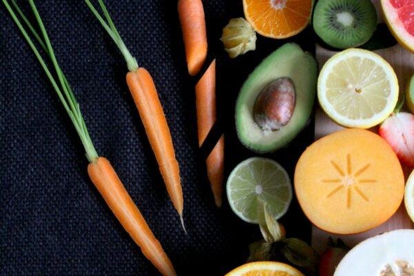 sliced vegetable and fruits on board