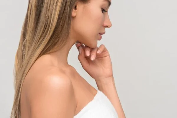 woman wearing white towel in a beautiful healthy spa